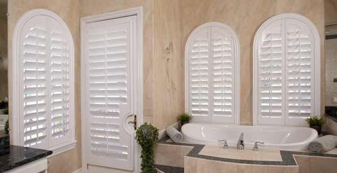 Arched window in bathroom